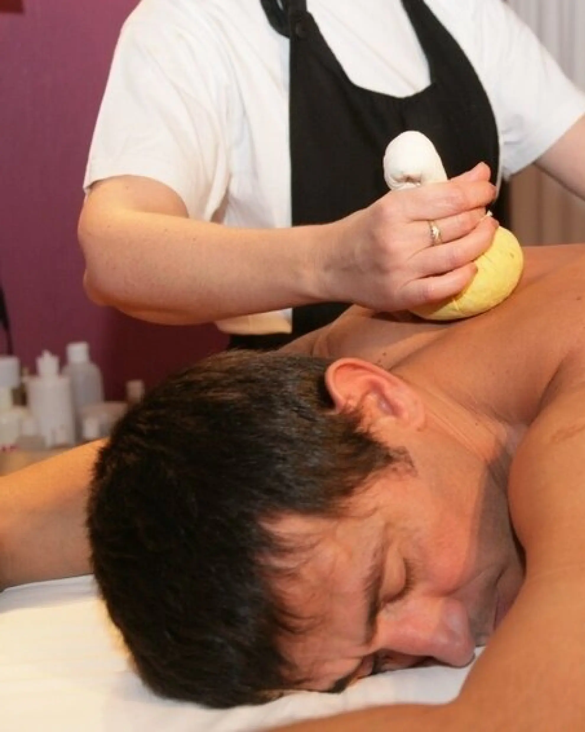 Wellness Massage Kraeuterstempel Adobe Stock 2122642